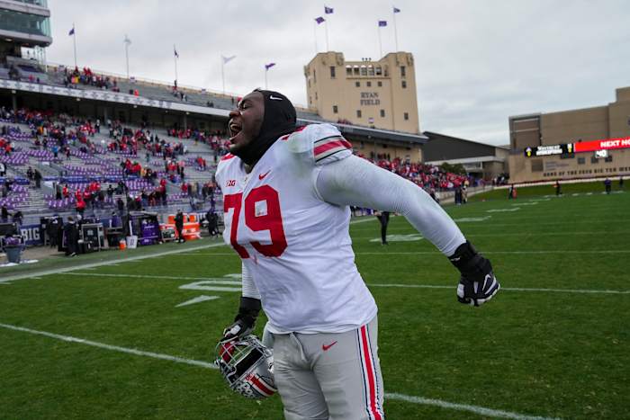 Nov 5, 2022; Evanston, Illinois, USA; Ohio State Buckeyes offensive lineman Dawand Jones (79) celebrates following the NCAA football game against the Northwestern Wildcats at Ryan Field. Ohio State won 21-7. Mandatory Credit: Adam Cairns-The Columbus Dispatch Ncaa Football Ohio State Buckeyes At Northwestern Wildcats